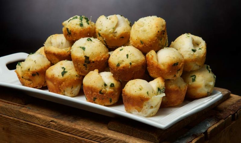 baked garlic cheese bombs on a plate