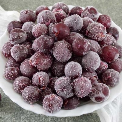 A bowl of frozen grapes.