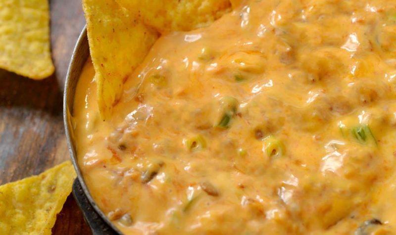 Jalapeno Dip in a skillet, with chips.