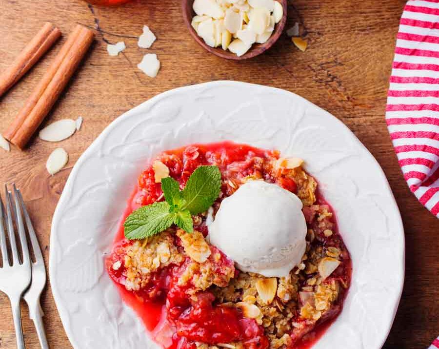 Rhubarb Butter Crunch on a white plate with ice cream