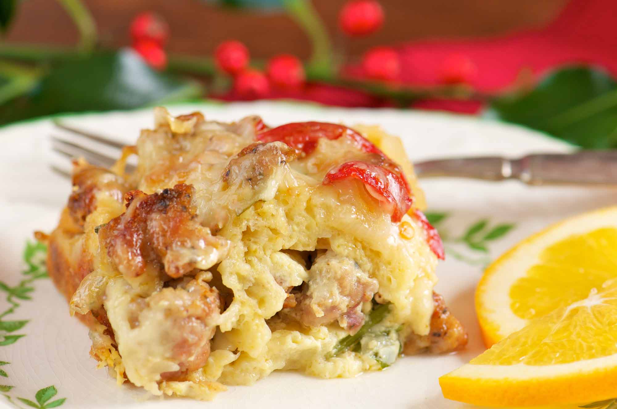 A closeup of a bacon and sausage breakfast casserole