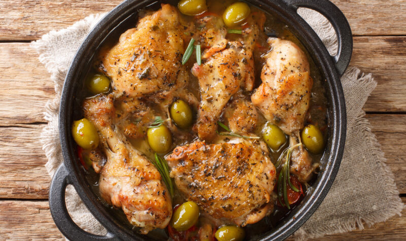 Chicken and olives in a skillet
