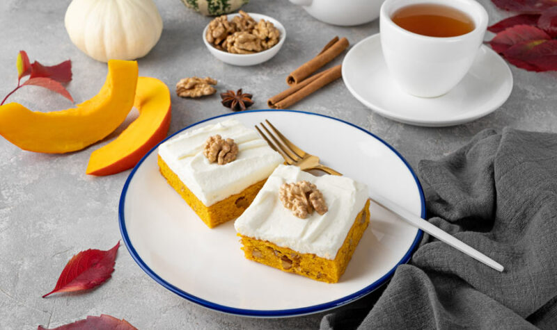 Pumpkin Bars on a plate with a fork.
