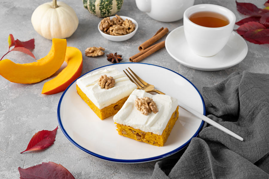 Pumpkin Bars on a plate with a fork.