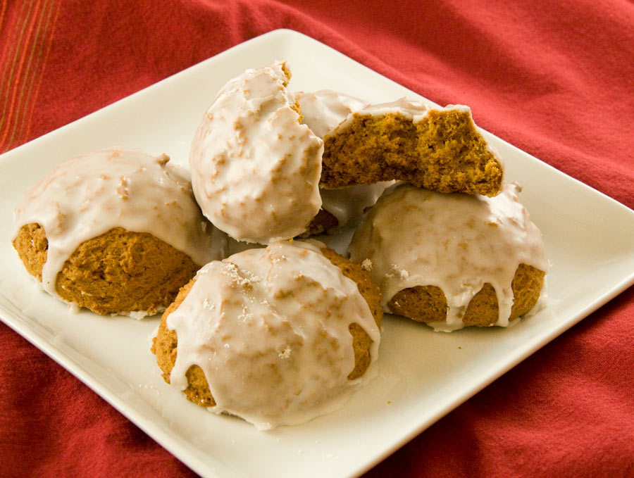 Pumpkin Cookies with Browned Butter Frosting on a white plate