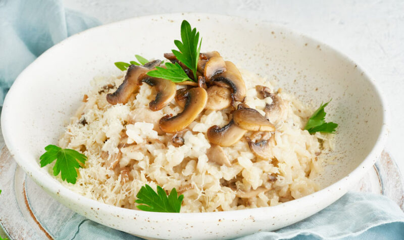 Mushroom rice casserole in a white plate