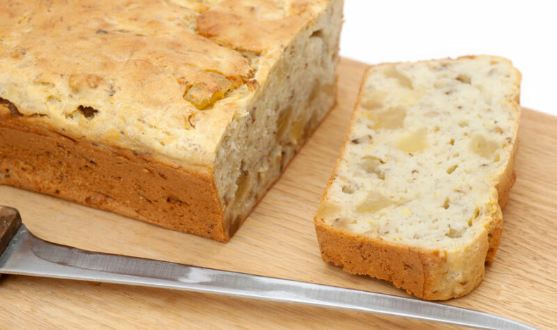 Pineapple banana bread on a cutting board