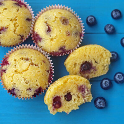 Blueberry Corn Muffins on a blue background