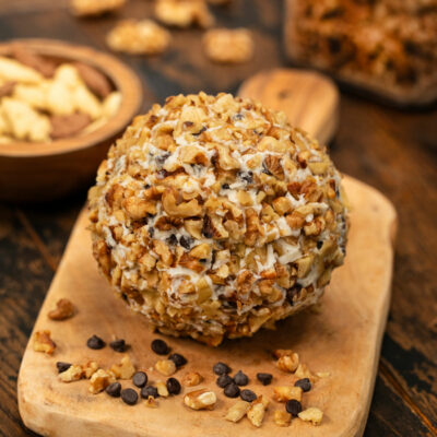 A chocolate chip cheese ball covered with walnuts