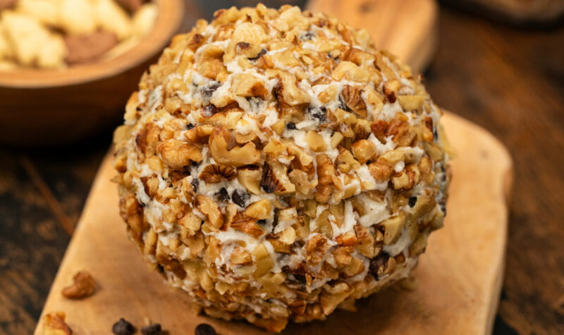 A chocolate chip cheese ball covered with walnuts