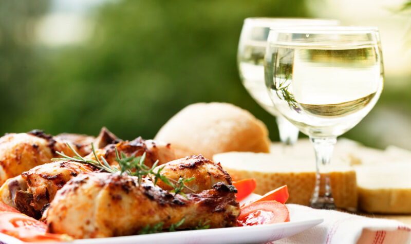 Chicken on a plate with white wine