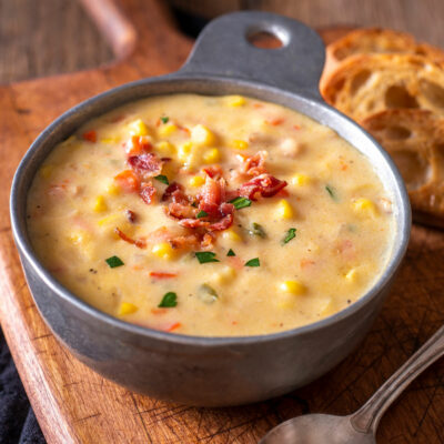 Corn Chowder with Bacon in a gray bowl