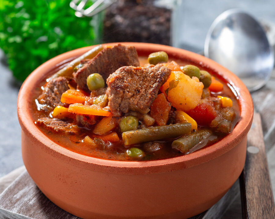 Slow Cooker Beef Stew in an orange pot
