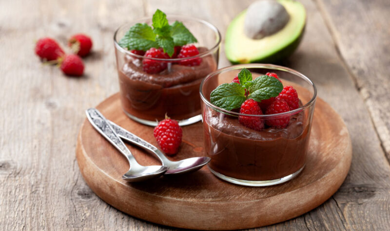 Avocado pudding with veggies and raspberries
