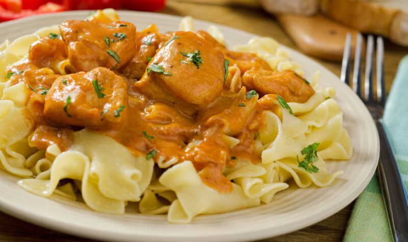 Chicken Paprikash over egg noodles