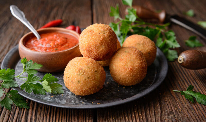 baked rice appetizers with marinara sauce