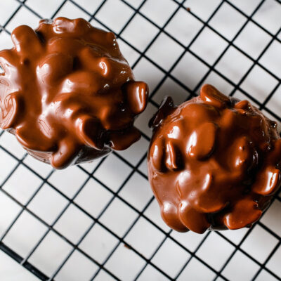 Chocolate peanut clusters on a baking mat