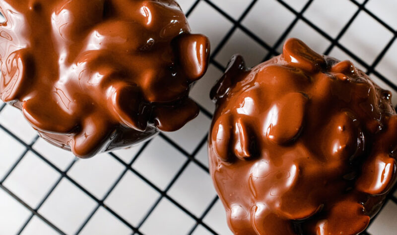 Chocolate peanut clusters on a baking mat